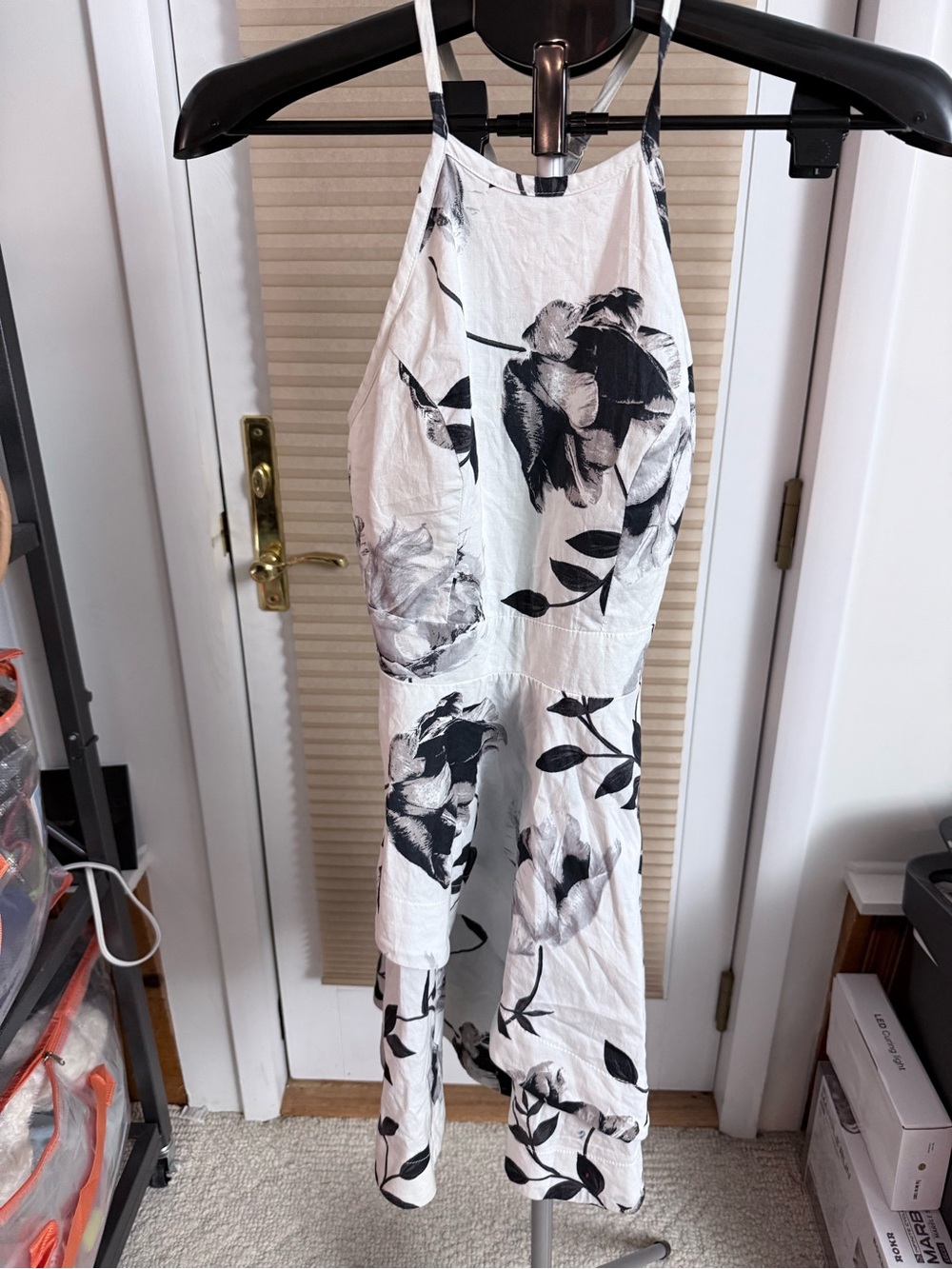 Modern romantic white black floral halter mini dress fit-and-flare silhouette